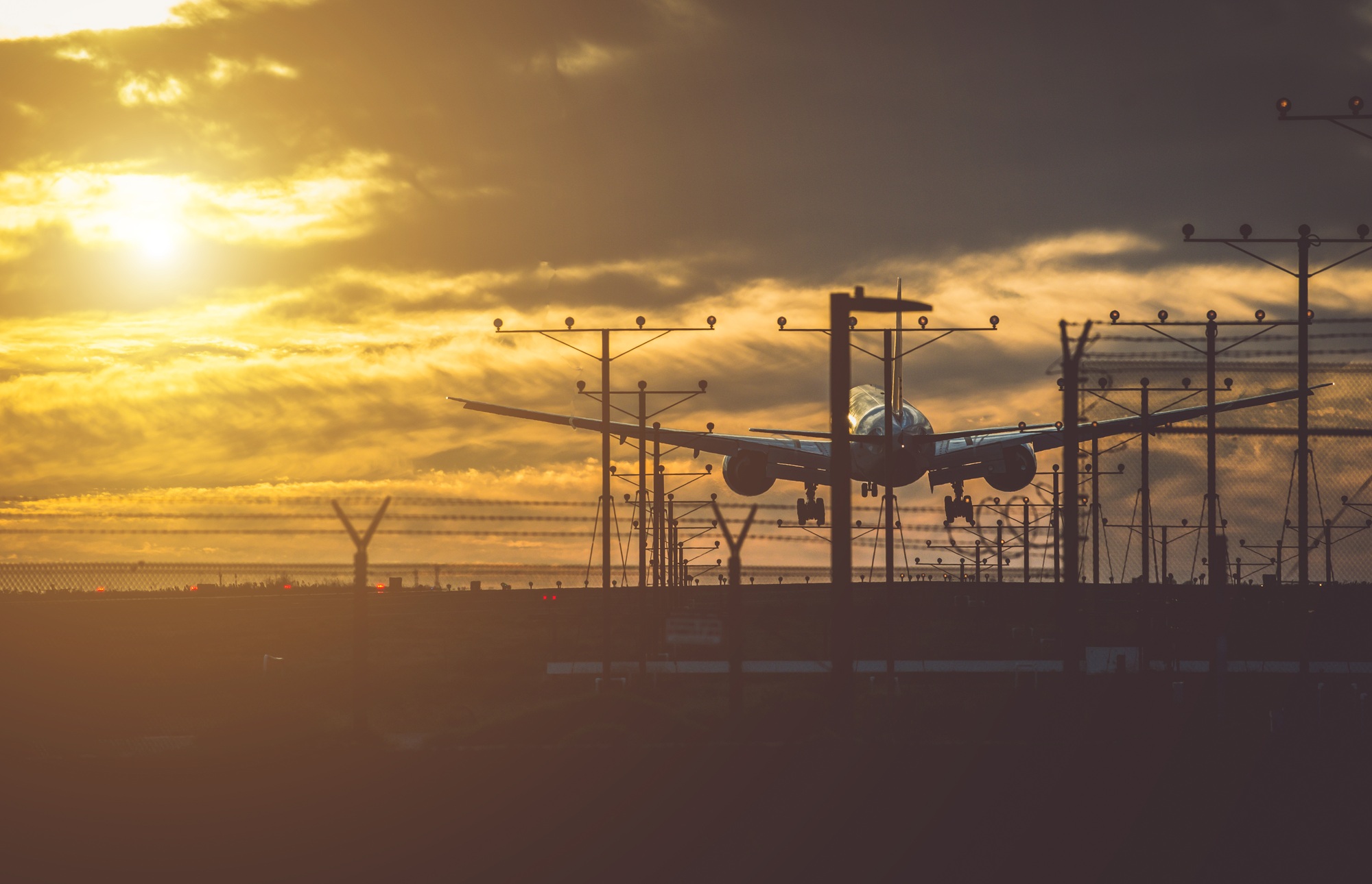 Airplane landing on the track